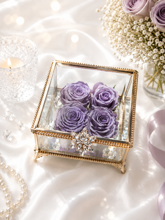 Glass box with purple roses on a soft white background